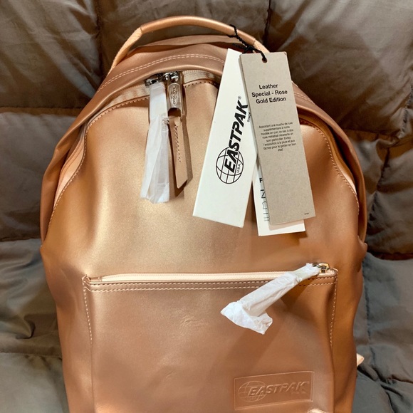Eastpak Handbags - Eastpak Leather Rose Gold Orbit Sleek’r Backpack